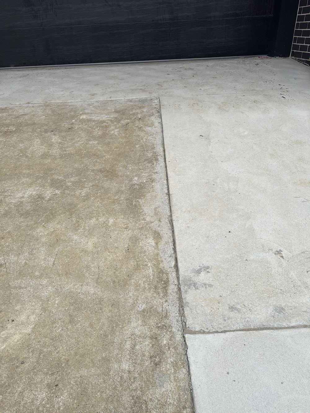 Driveway poured in sections without proper tie-in or movement joints, recorded during a defect investigation in Ermington